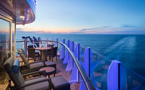HM, Harmony of the Seas, AquaTheater Suite w/Balcony, Cat. A3 - Balcony, Room #11330, Deck 11 Aft Portside, cabin, stateroom, outside view of balcony with wake of ship in ocean in background, lounge chairs, table, ocean view,
