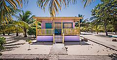 Beach house with Hammock in Placencia, Belize. The Caribbean.