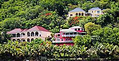 Colorful houses on Tortola on hillside. The Caribbean.