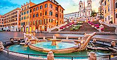 the golden fountain of the Piazza de Spagna at sunrise. Europe.