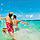 Couple Splashing at the beach, George Town, Grand Cayman | HP Mobile