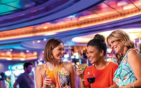 Casino Royale Girlfriends Enjoying Cocktail at the Bar