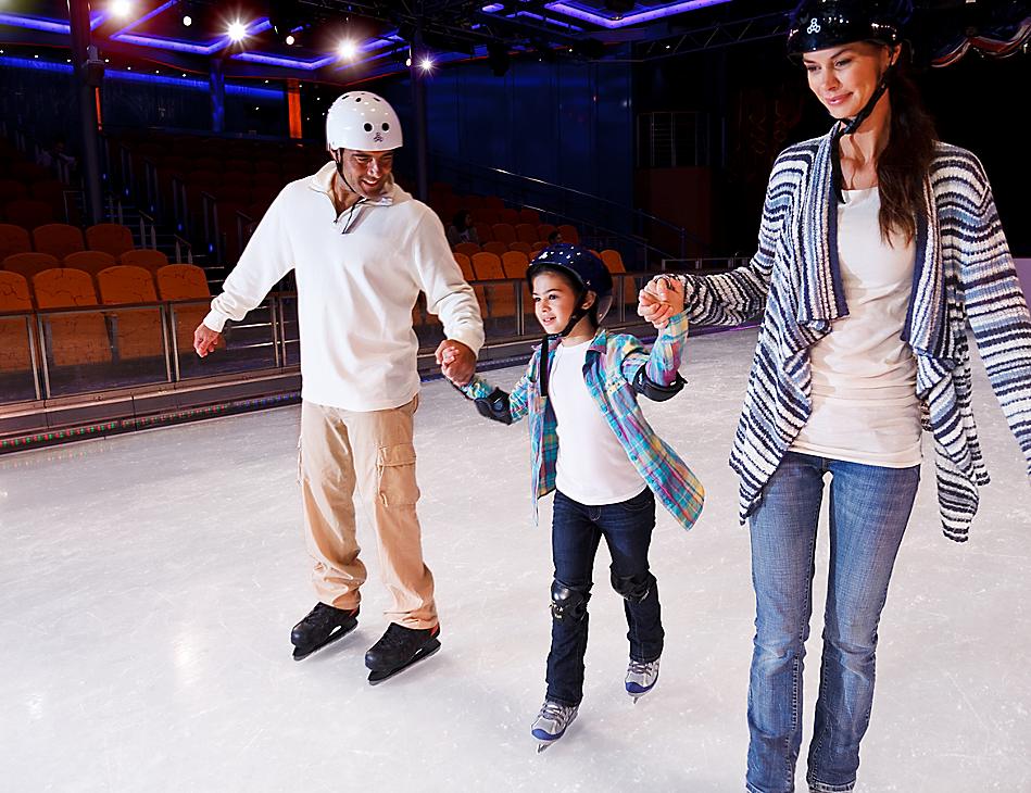 Parents Skating with their Daughter