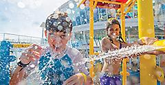 Girl Splashing Boy at Splashaway Bay 