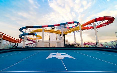 Sports Court with Slides in the Background on Navigator of the Seas