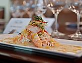 Lobster & Alaska king crab main entree, served at the Elegant Chefs Table restaurant. One of the best cruise line fine dining