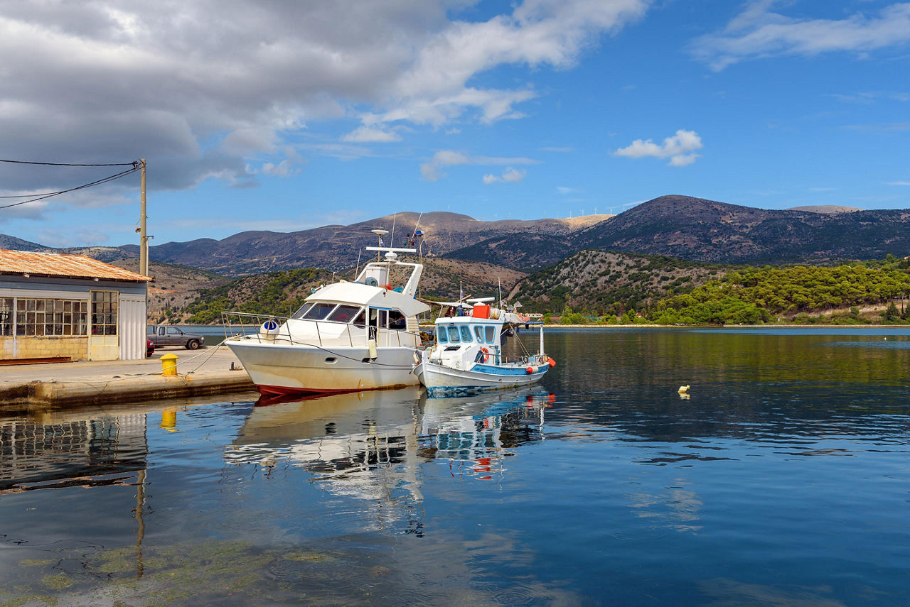 Fishing boats anchoring by Koutavos Lagoon in Argostoli, Greece