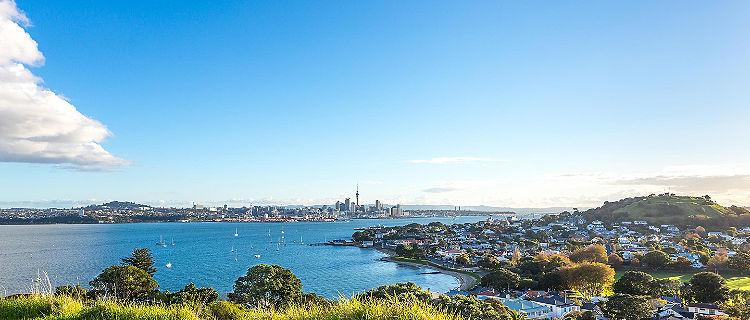 Waitemata harbor with a view of Auckland, New Zealand in the distance