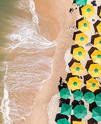 banana coast honduras tropical beach top view umbrellas