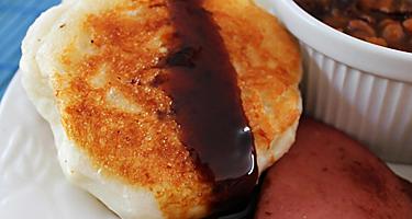Toutons with molasses poured on top