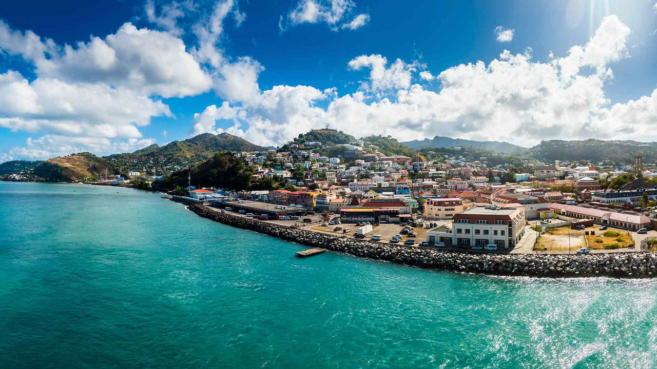 Ocean view of city and the town along the water in St. Georges, Grenada