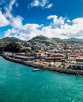 Ocean view of city and the town along the water in St. Georges, Grenada
