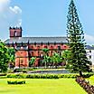 Basilica of Bom jesus in Old Goa inspired by Portuguese architecture with lush landscape in Goa, India
