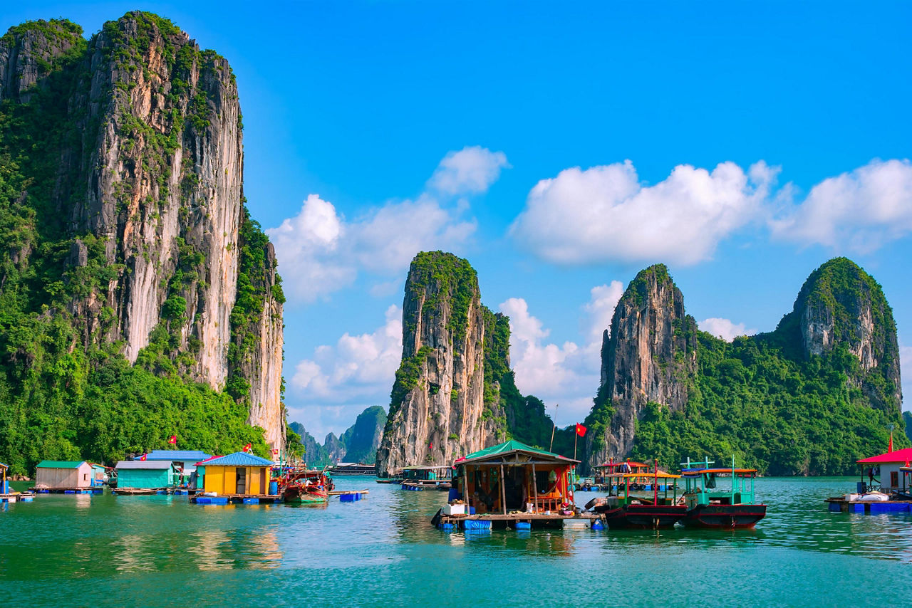 A floating fishing village and rock islands in Ha Long Bay, near Hanoi, Vietnam