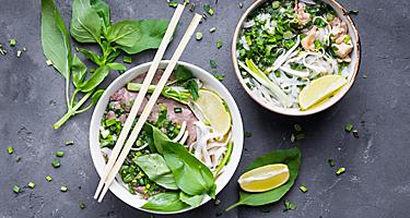 Traditional vietnamese noodle soups pho in bowls