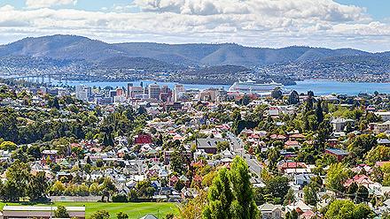 Aerial view of the city of Hobart, Tasmania with a cruise ship in the ditance