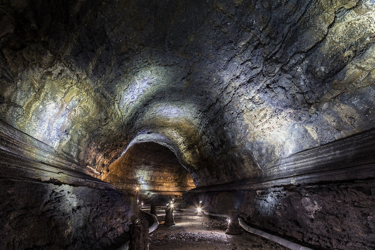 A dark underground cave in the empty Manjanggul Lava Tube Cave on Jeju Island, South Korea