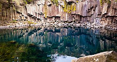 Pond of famous Cheonjiyeon Falls on Jeju Island of South Korea