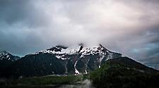 The view of a mountain on a cloudy winter day in Juneau, Alaska 