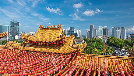 Thean Hou Temple in Kuala Lumpur on Chinese New Year with red lanterns lined up along the roof 