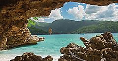Labadee Haiti Man Cliff Diving off a Cave Rock
