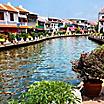 Historical part of the old malaysian town Malacca, Malaysia, with a river and colorful houses