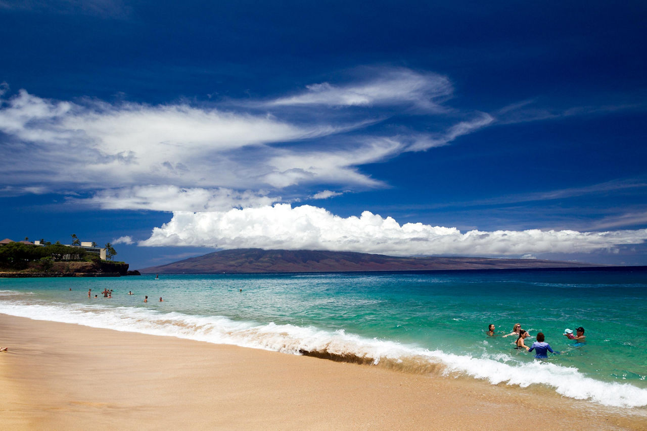 Kaanapali beach in Lahaina, Maui, Hawaii with views of volcanos