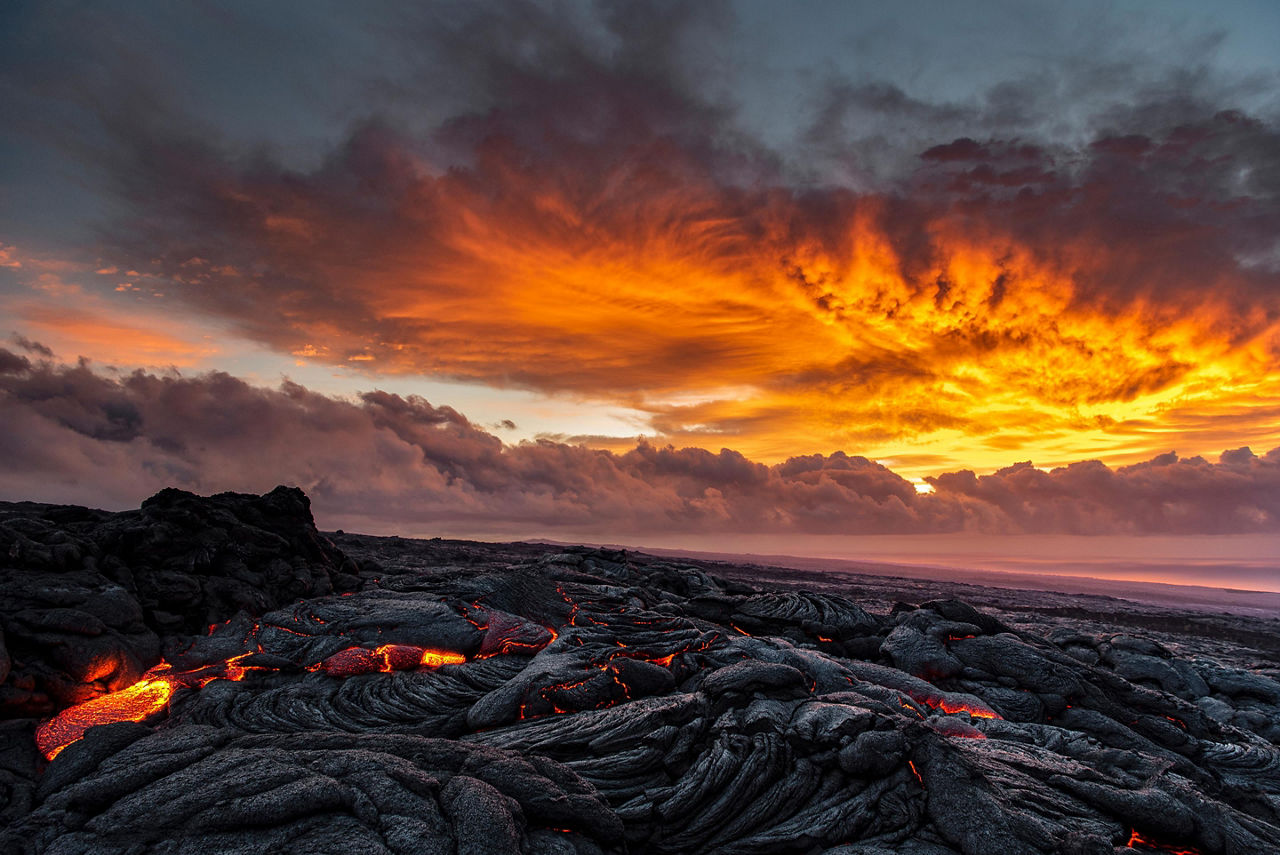 Lava flow entering the ocean from the Kilauea volcano in Mount Kilauea, Hawaii