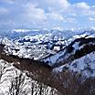 View of the snow mountain range from a gondola during Winter in Niigata, Japan