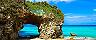 Okinawa, Japan Arched Rock On Beach