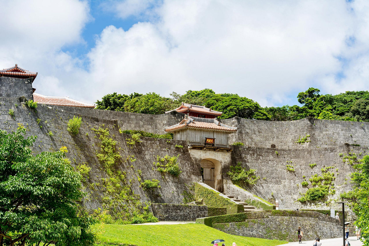 Ancient Kyueimon Gate in wall of Shuri Castle in Okinawa, Japan