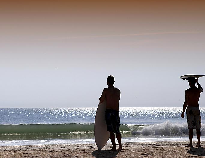 Surfer's Standing Beach Waves, Orlando, Florida