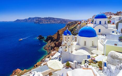 Classic white and blue houses of Oia in Santorini, Greece