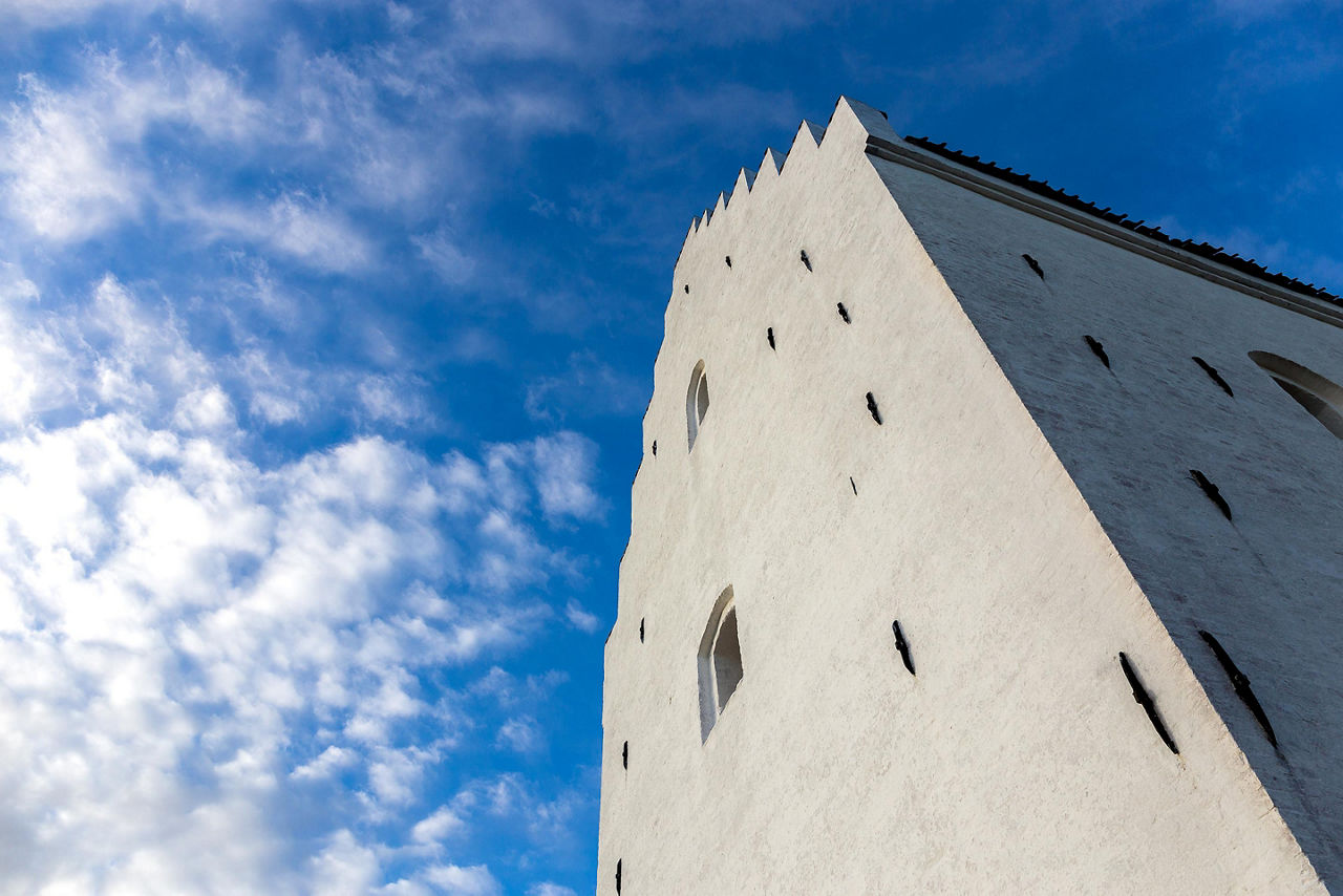 A close-up view of The Sand-Covered Church in Skagen, Denmark