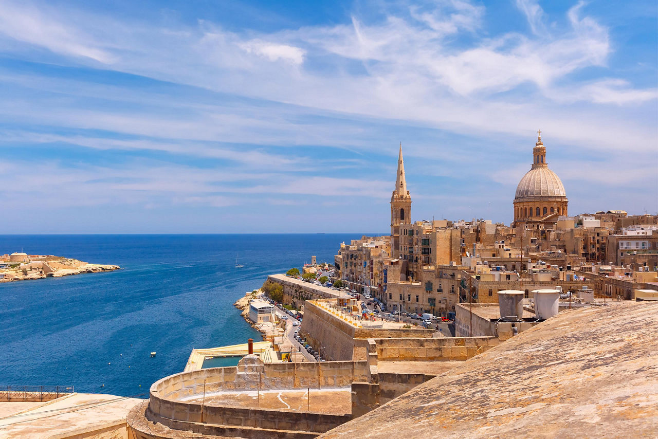 Coastal view of the sea wall and buildings in Valletta, Malta