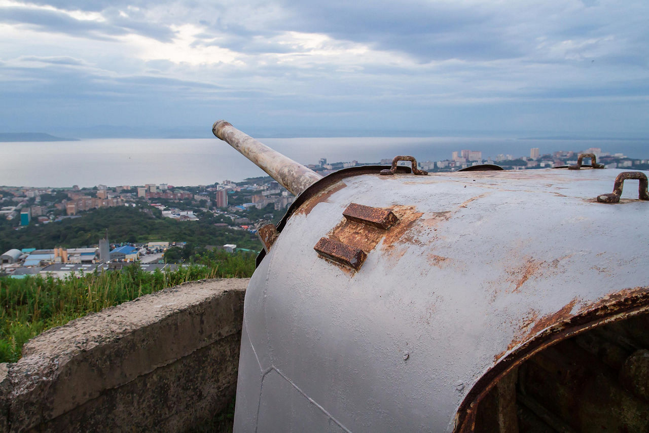 An old abandoned gun battery aiming at the bay in Vladivostok, Russia