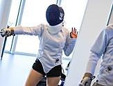 Spectrum of the Seas Woman Fencing with Sword