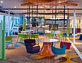 plashaway Cafe Interior with Swinging Colorful Chairs