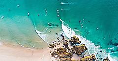 Aerial View of Surfers waiting for Best Surfing Waves in Byron Bay, Australia.