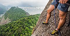 Man rock climbing in Pao de Acucar Mountain, Rio de Janeiro. Brazil.