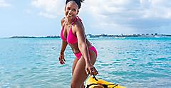 Eastern Caribbean Woman Pulling Kayak
