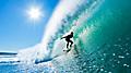 Surfer on Amazing Blue Wave in the Epic Barrel Tube Hawaii