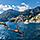 Italy Naples Positano Couple Jumping in Ocean