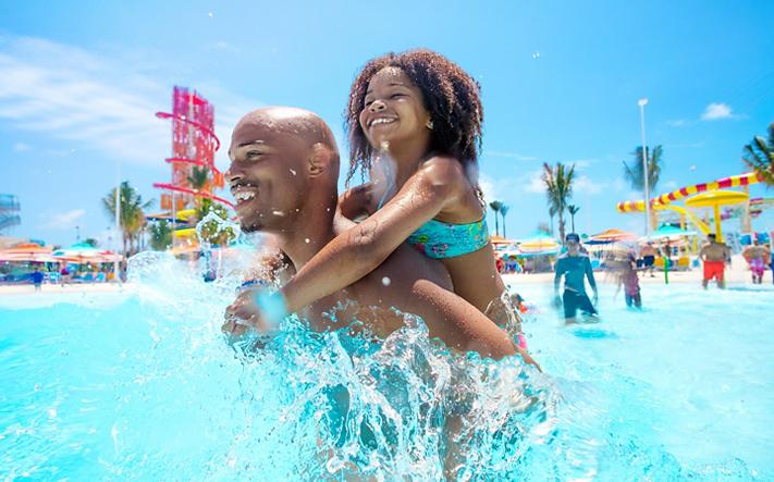 Father and Daughter Enjoying the Tidal Wave Pool 