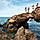 Family Jumping Through Rocks, Oranjestad, Aruba