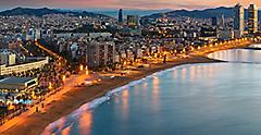 Aerial view of Barcelona beach and city during sunrise. Spain.