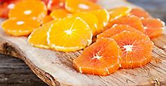 Sliced Fresh Oranges on Cutting Board
