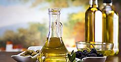 Olive Oil Bottles with Olives 