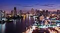 View of the city and the Chao Phraya River at night fall in Bangkok, Thailand
