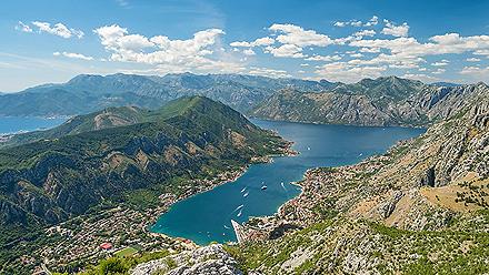 Summer view of the Bay of Kotor in Montenegro. Aerial view from Mount Lovcen Summer view of the Bay of Kotor in Montenegro. Aerial view from Mount Lovcen Summer view of the Bay of Kotor in Montenegro. Aerial view from Mount Lovcen 